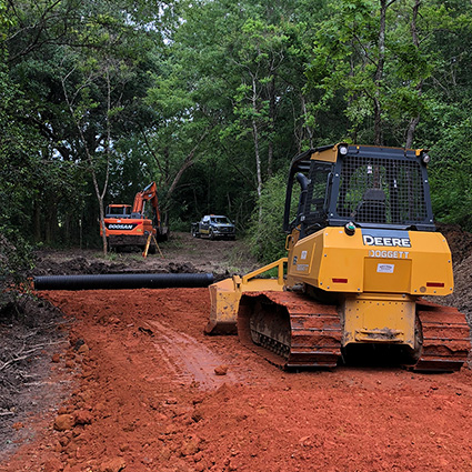 Photo of Delta Materials equipment putting in a road